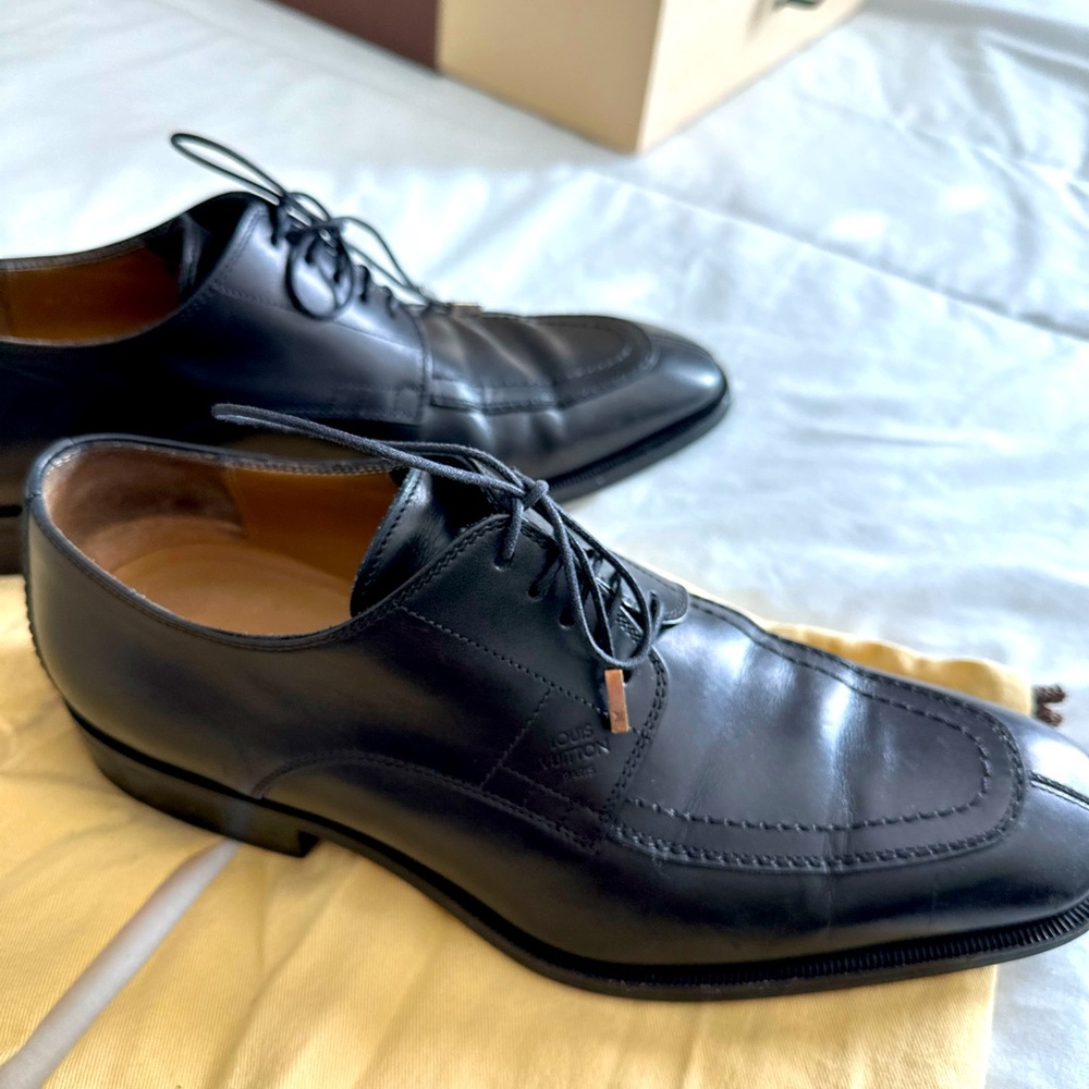 Louis Vuitton high end men’s dress shoes. Luxurious black leather.
